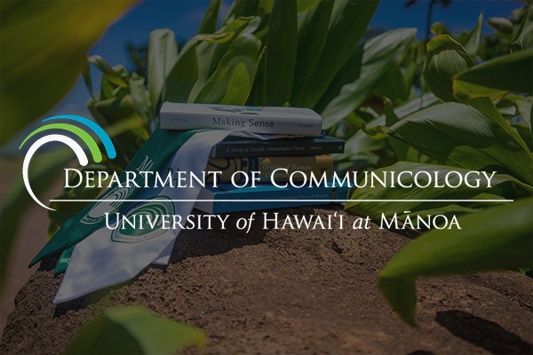 image of Communicology books on lava rocks